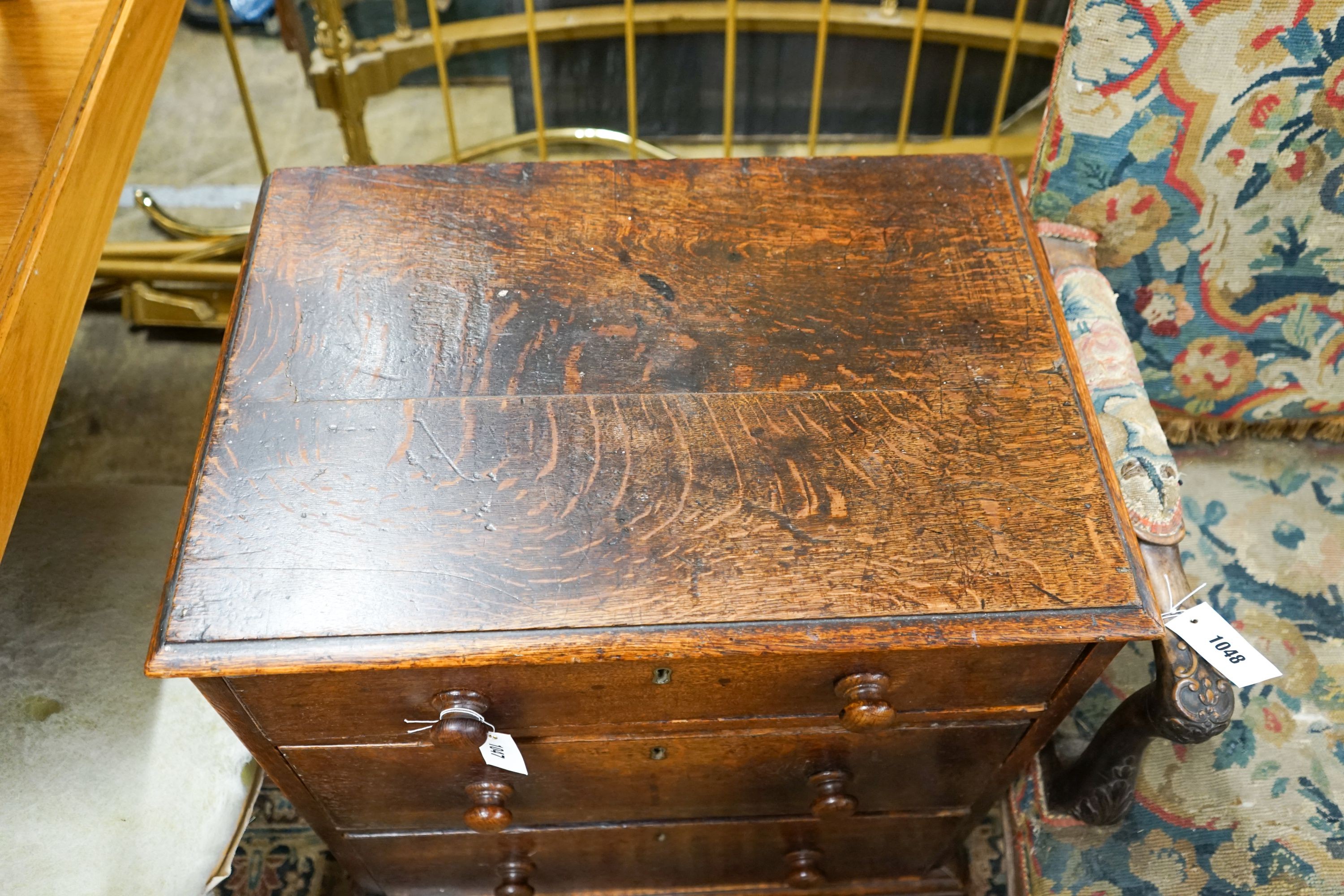 A small Victorian oak three drawer chest, width 61cm, depth 43cm, height 71cm